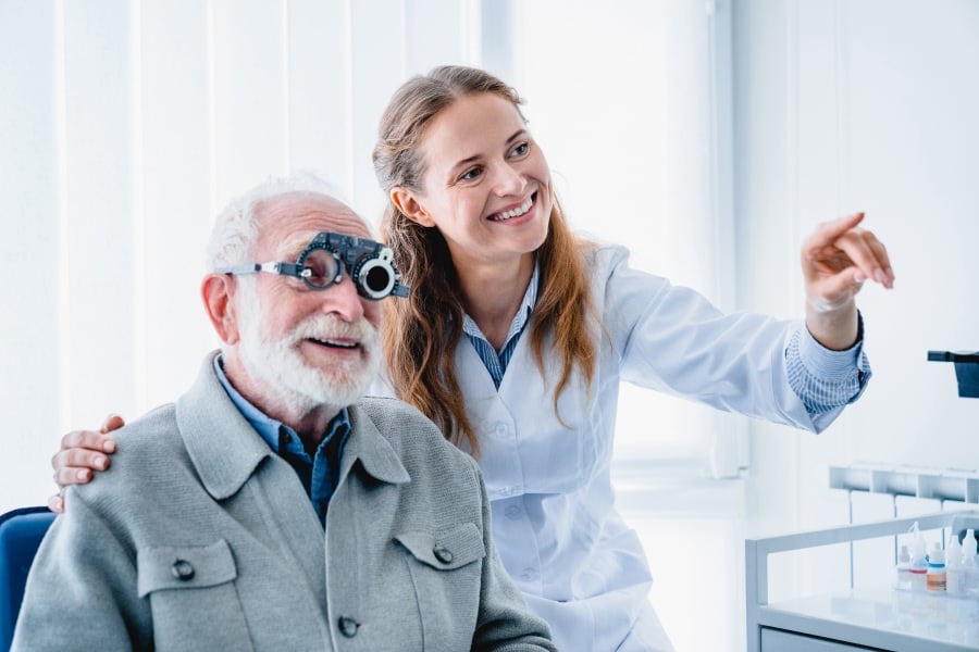 Senior having a vision exam covered under a Medicare Advantage plan